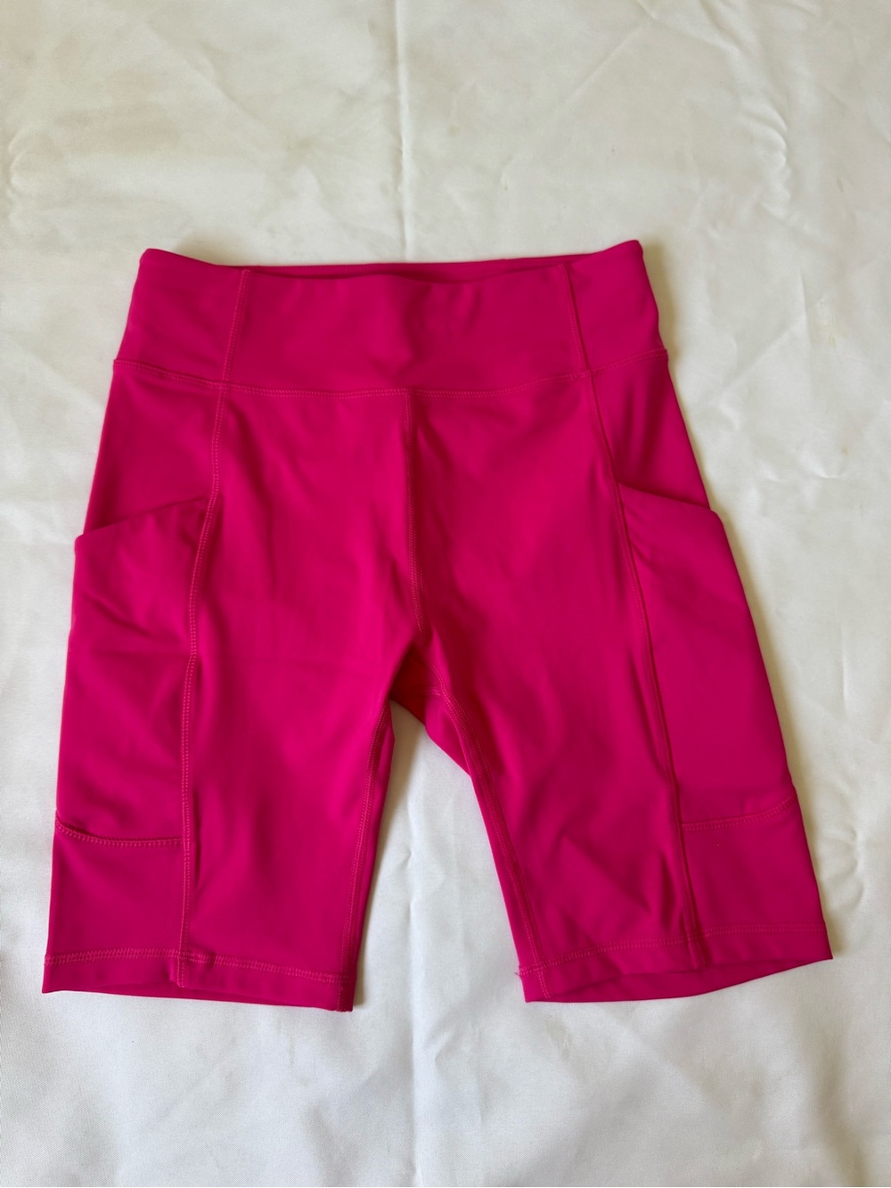 Monrow Vibrant Pink High-Rise Bike Shorts with Side Pockets